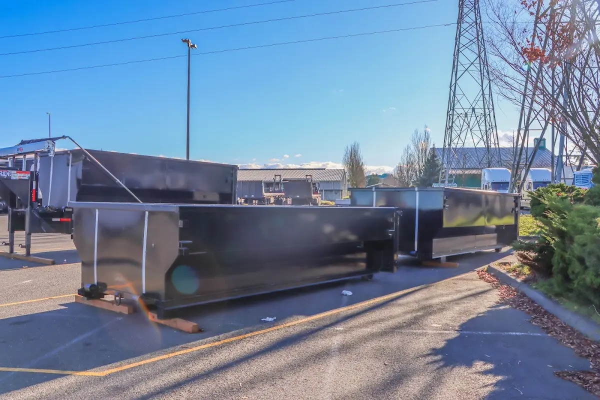 Roll-off dumpster ready for waste disposal at job site for Construction Dumpster Rental in Milliken
